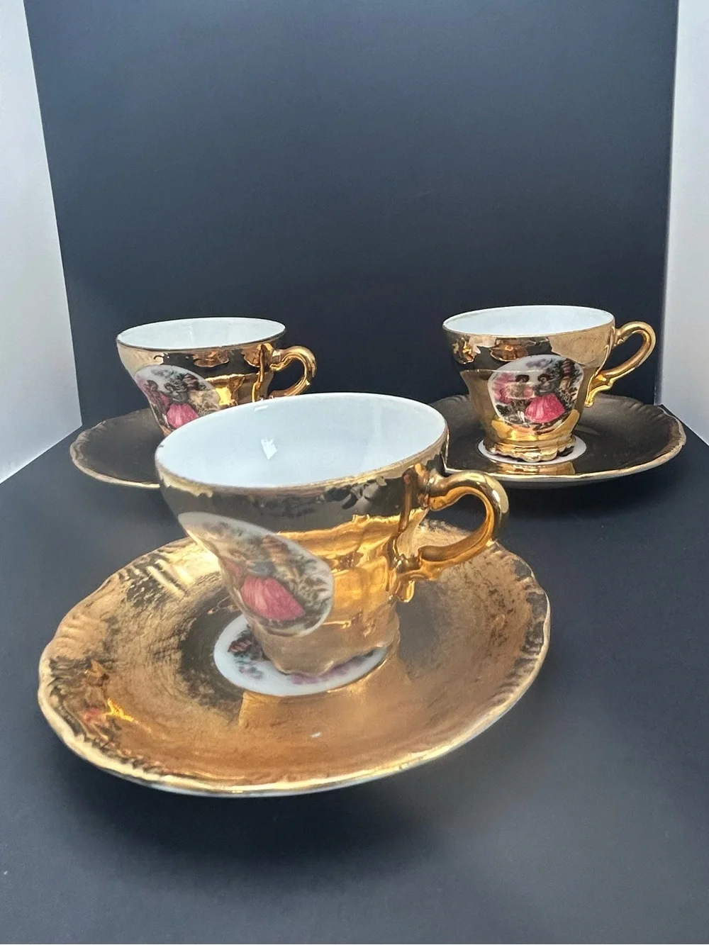 Vintage Golden Courting Colonial Couple Cup and Saucer
